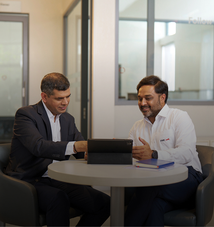 TVS colleagues collaborating with a value-chain partner