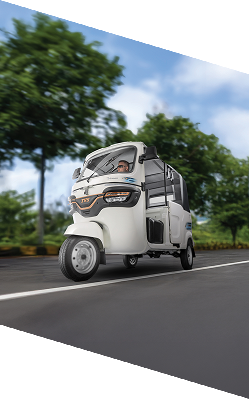 TVS electric three-wheeler on the road