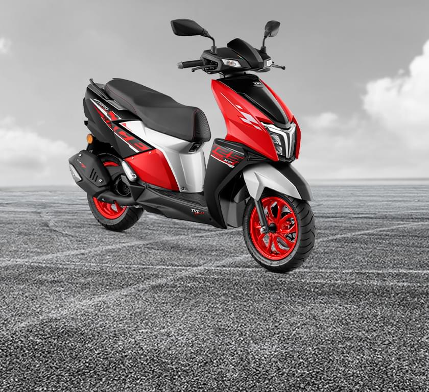 TVS Ntorq XP 125 scooter is presented in an overview image, highlighting its dynamic black and red color